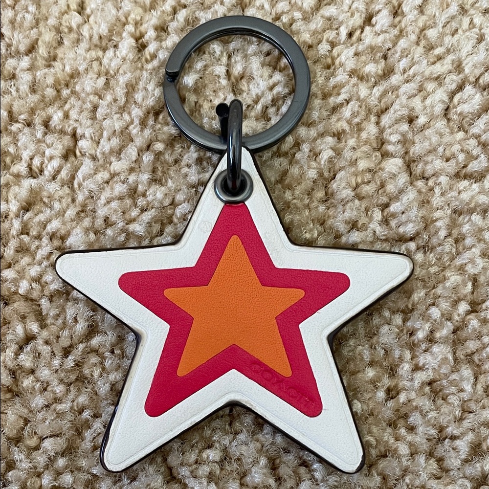 Coach star bag charm